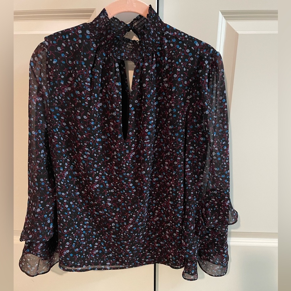 1.State floral blouse size small